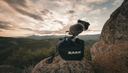 Sakk Camera Saddle sitting on a rock