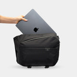 Sling bag fits 13” laptop, camera body, and tech essentials