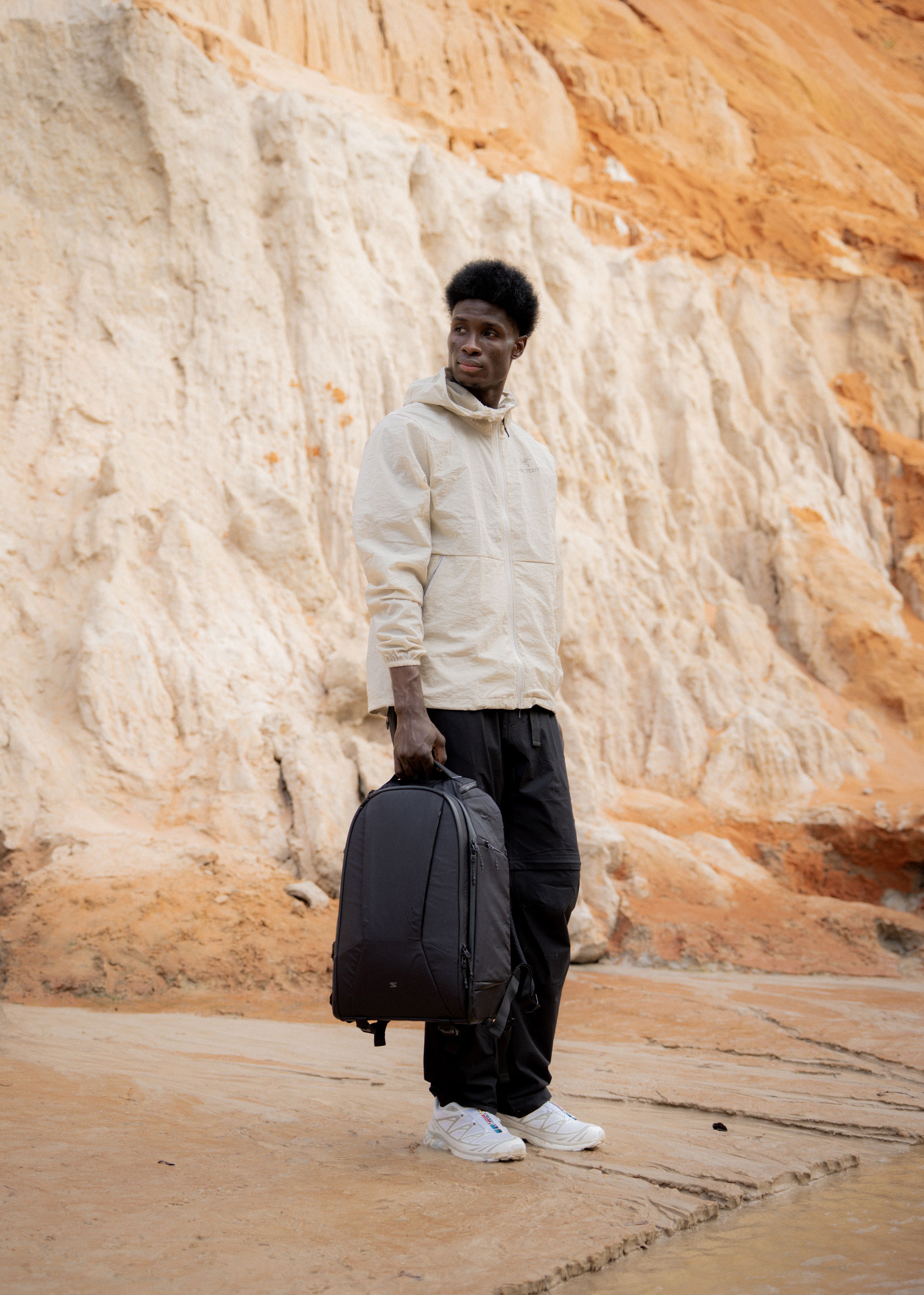 Fits full 14” laptop with camera gear. Balanced load without bulk