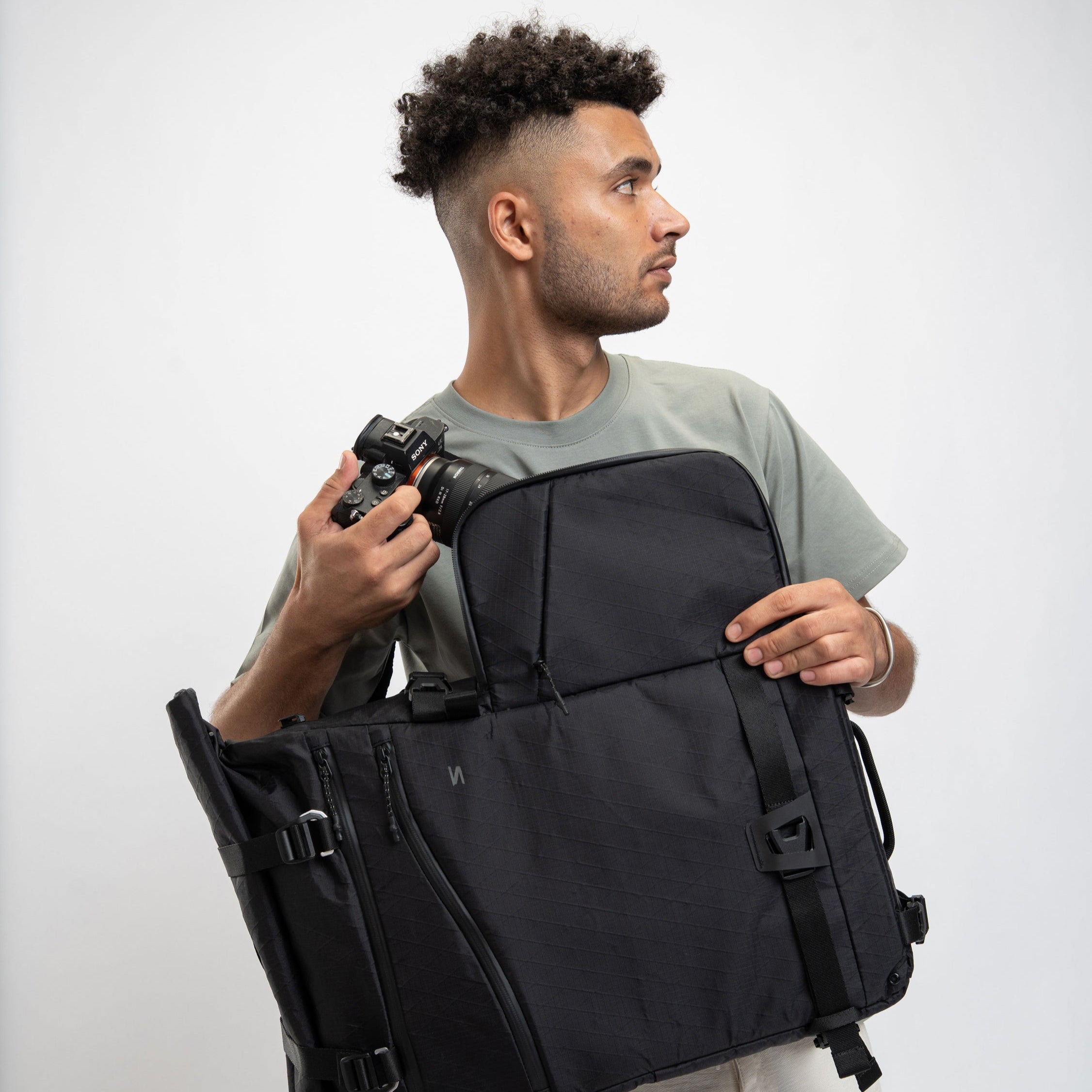 5L DSLR backpack for creators on the go—fits full kit plus clothes, laptop, and cables for extended shoots.