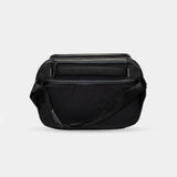 Black camera sling bag with internal and external pockets