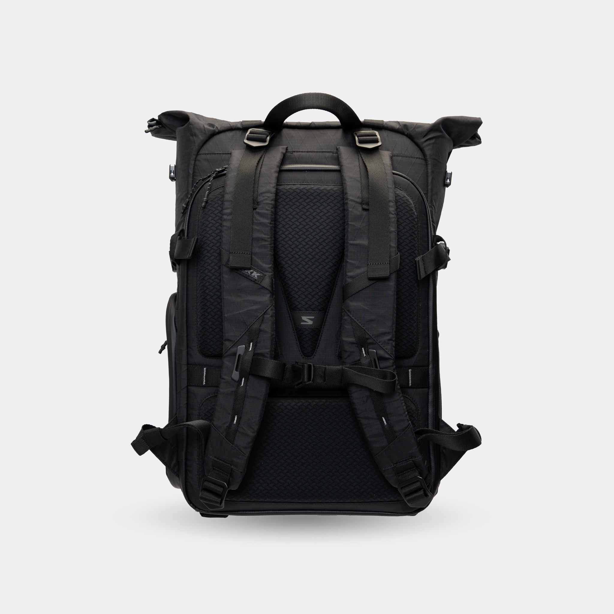 Built for travel shoots—carry DSLR, laptop, lenses, and accessories in one sleek expandable rolltop pack.