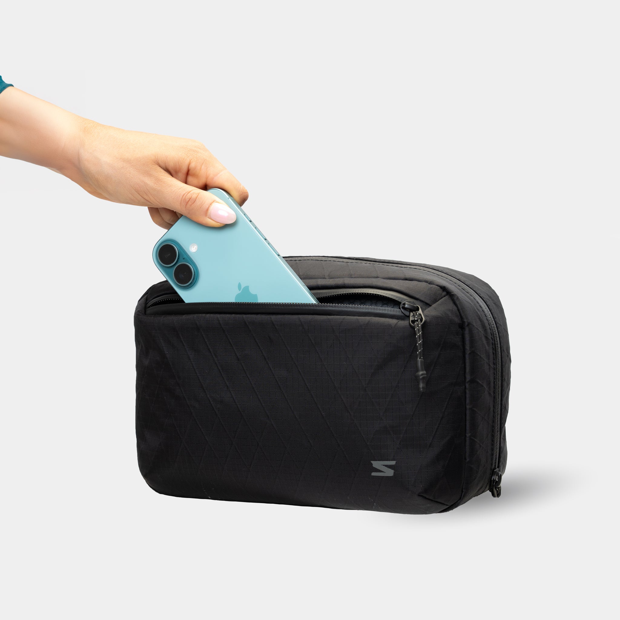 Tech pouch with smart internal organizer. Light weight and weatherproof. 