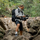 Reliable carry-all for travel-heavy creators—features waist support and smart compartment design.