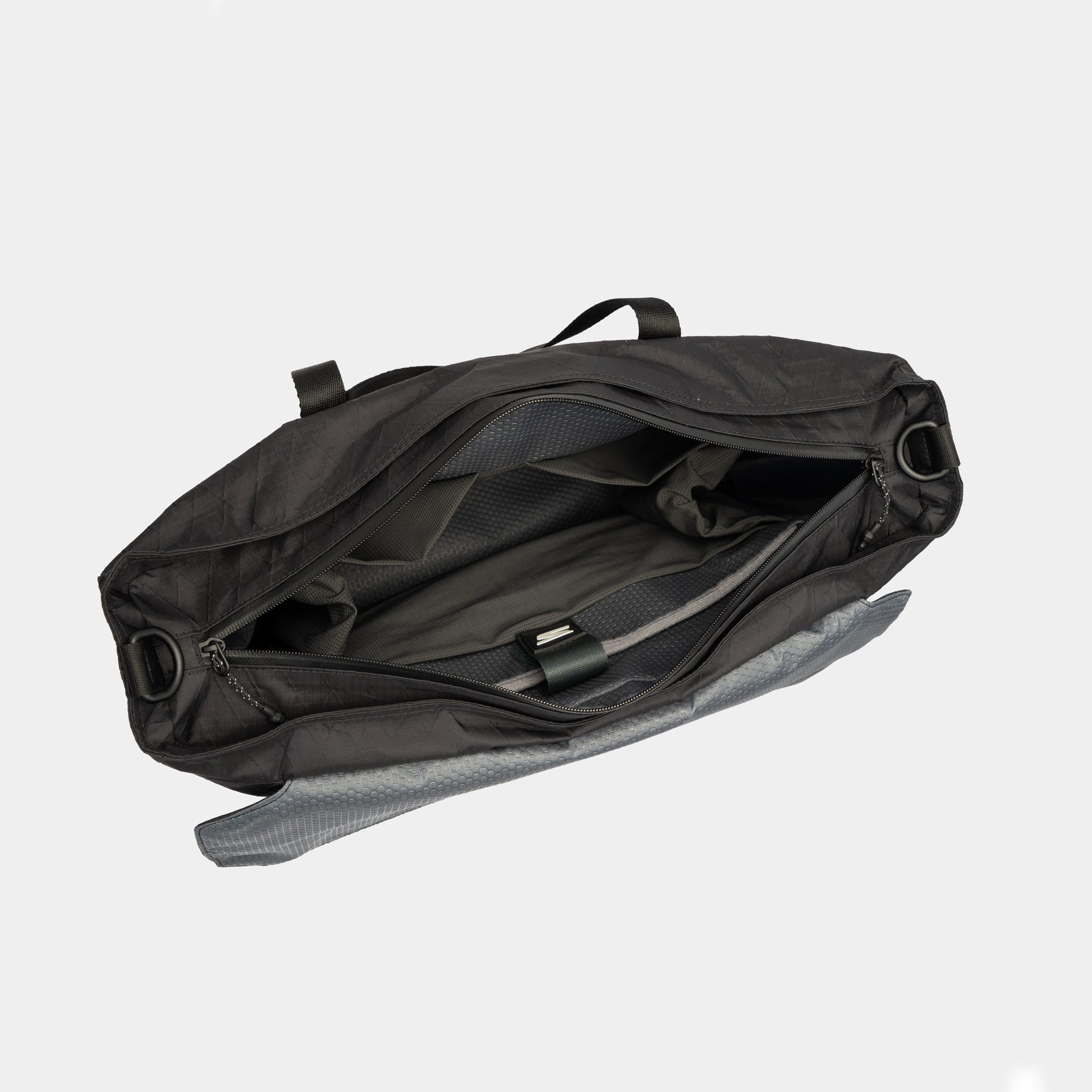 Minimalist creator tote fits iPad, mirrorless camera, and personal gear. Great for mobile setups.