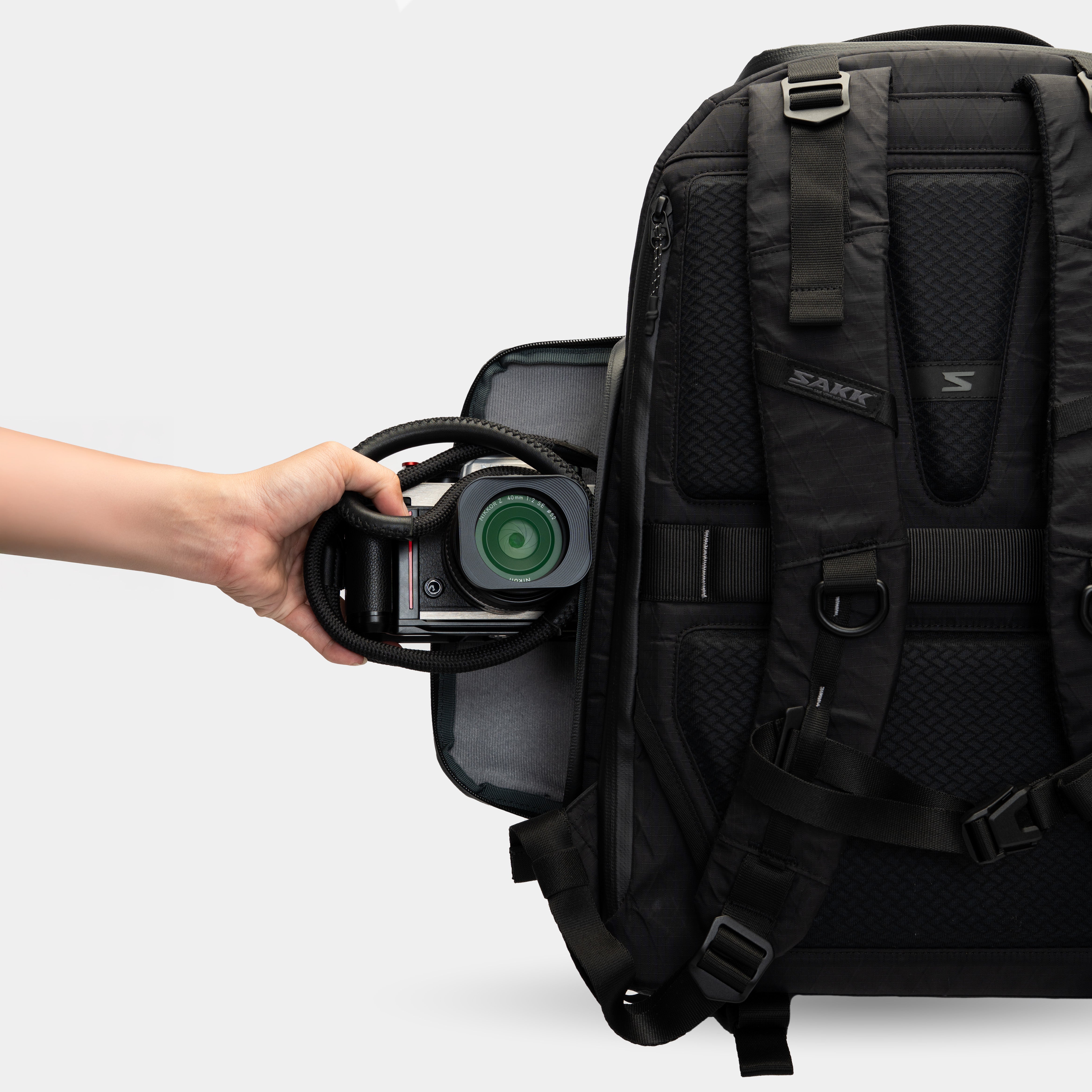 Camera backpack with padded waist strap for extra support
