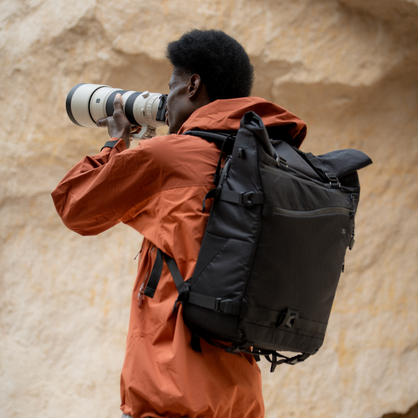 Rolltop pro camera backpack made for mobile crews—strap in your tripod, slide onto your luggage.