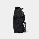 Slim side view showing compression strap, secure side pocket, and attachment point for modular gear add-ons.