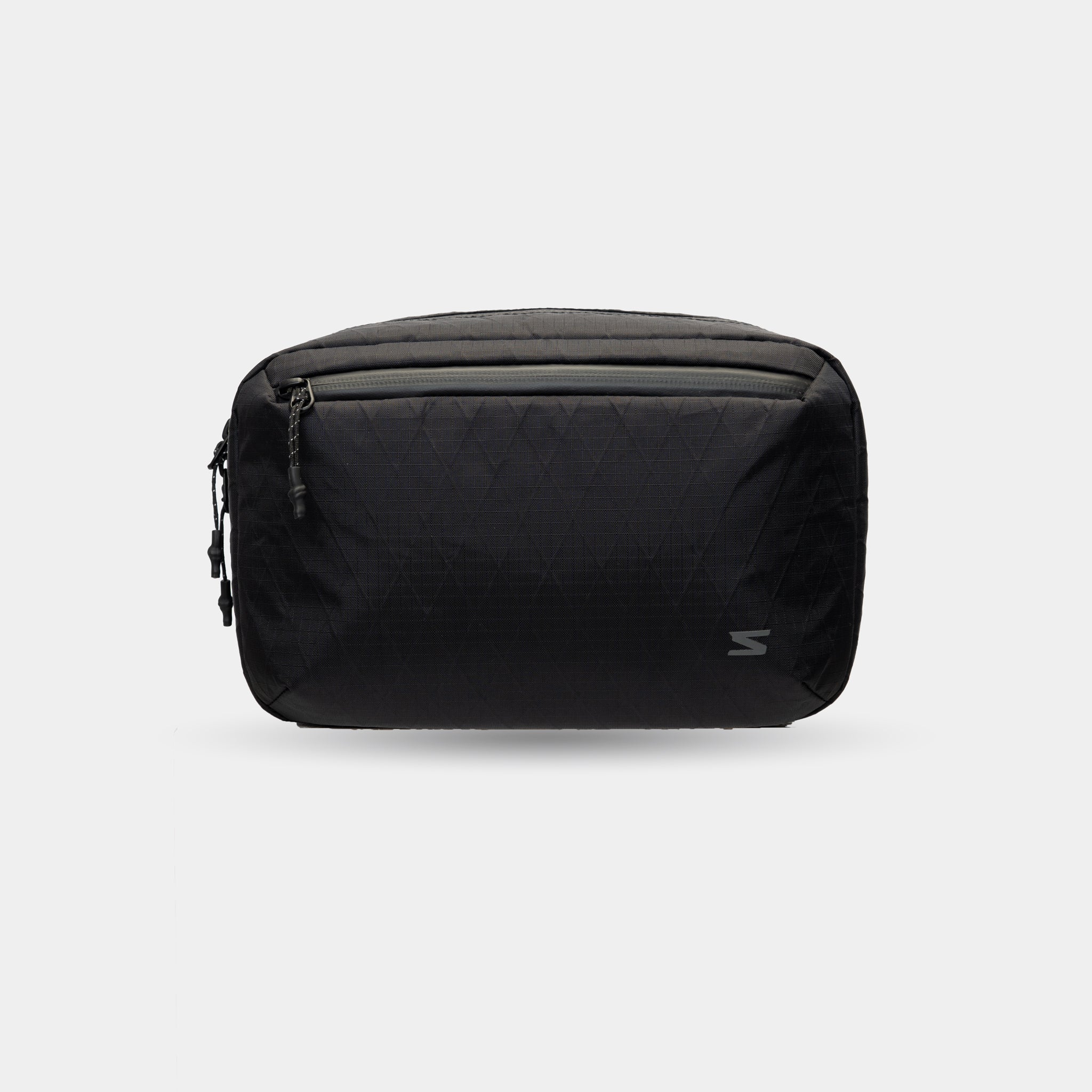 Sling pouch for tech cables, SD cards, and batteries. Keeps essentials sorted and clutter-free.