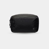 Sling pouch for tech cables, SD cards, and batteries. Keeps essentials sorted and clutter-free.