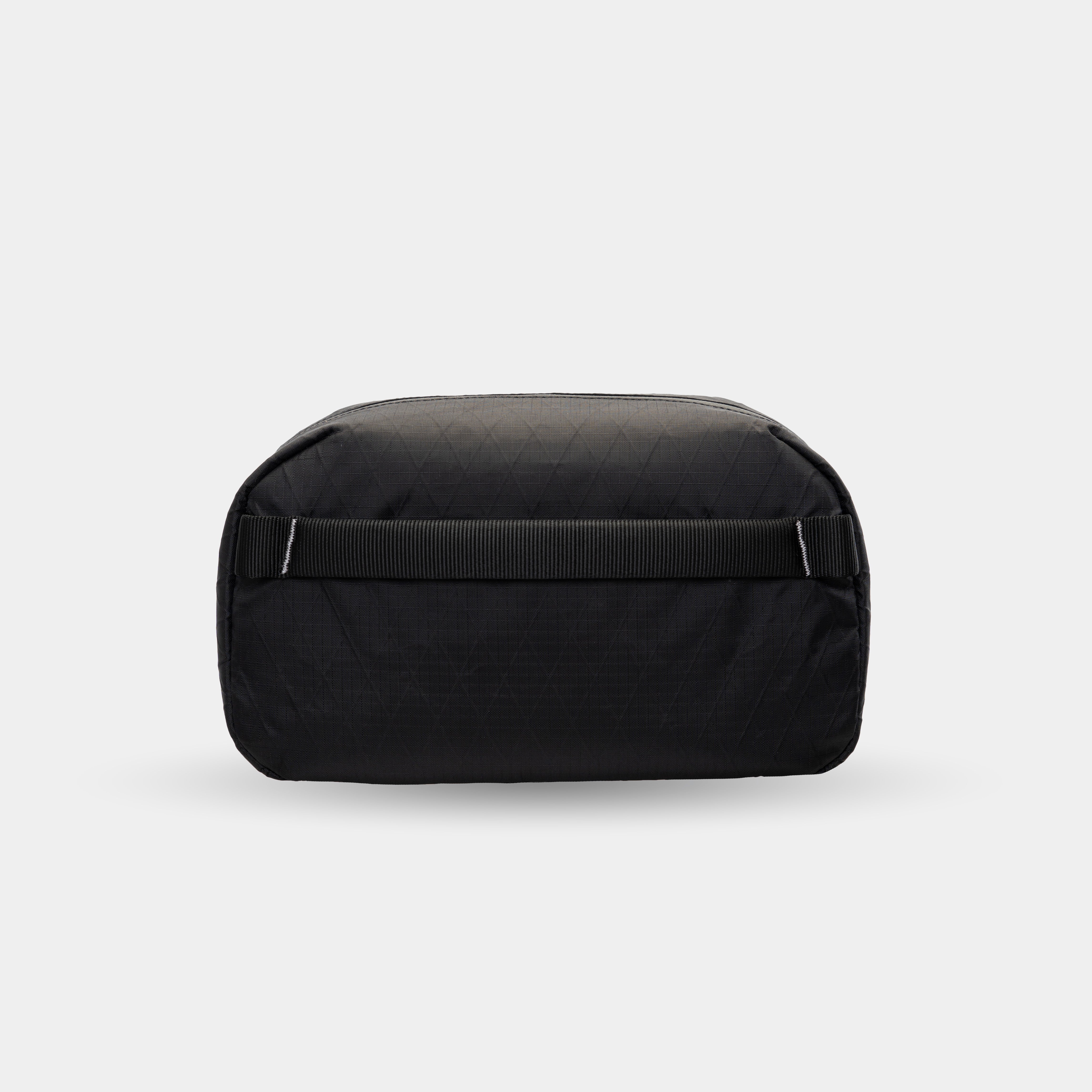 Travel organizer for USB sticks and dongles. Keeps tiny gear secure and ready.