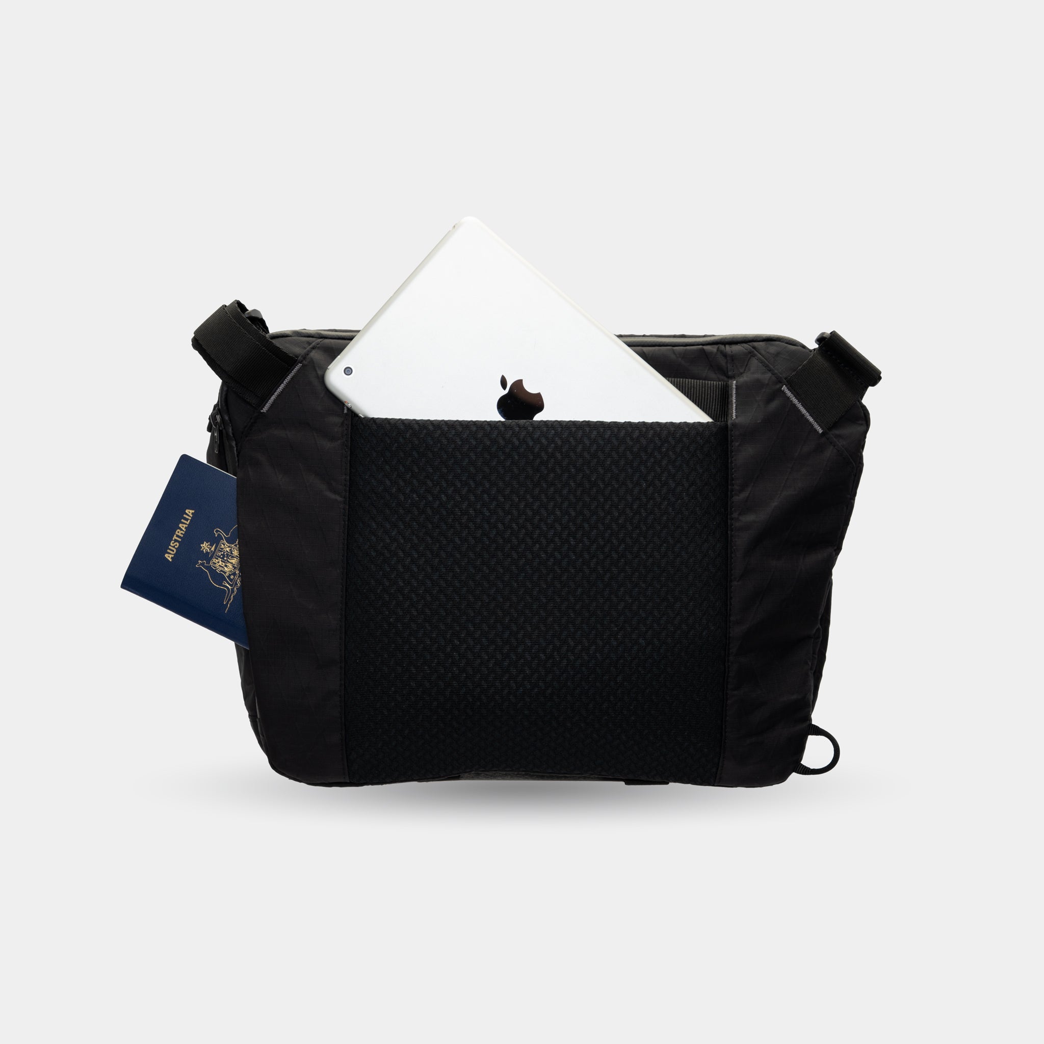 Waterproof sling with laptop sleeve and gear dividers
